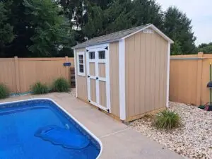 backyardn storage shed near swimming-pool